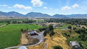 Overview of rural landscape with a mountain backdrop