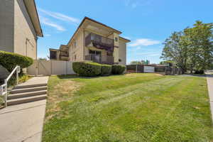 Back of property featuring a gate