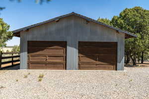 Detached garage with fence