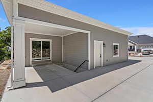 Back of property featuring a patio