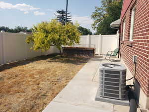 Fenced backyard featuring a patio area