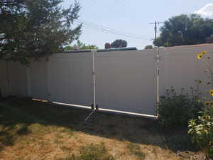 View of yard with a gate