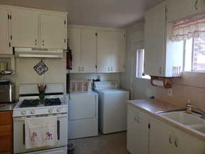 Washroom with separate washer and dryer