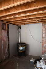 Below grade area featuring a wood stove
