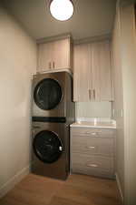 Laundry area featuring washer and dryer included