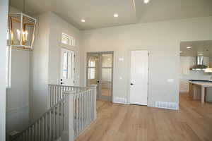 This home features grand 12 foot entry 8 foot doors and wonderful space off entry large enough for living room or office we think you might love the flow of this home.