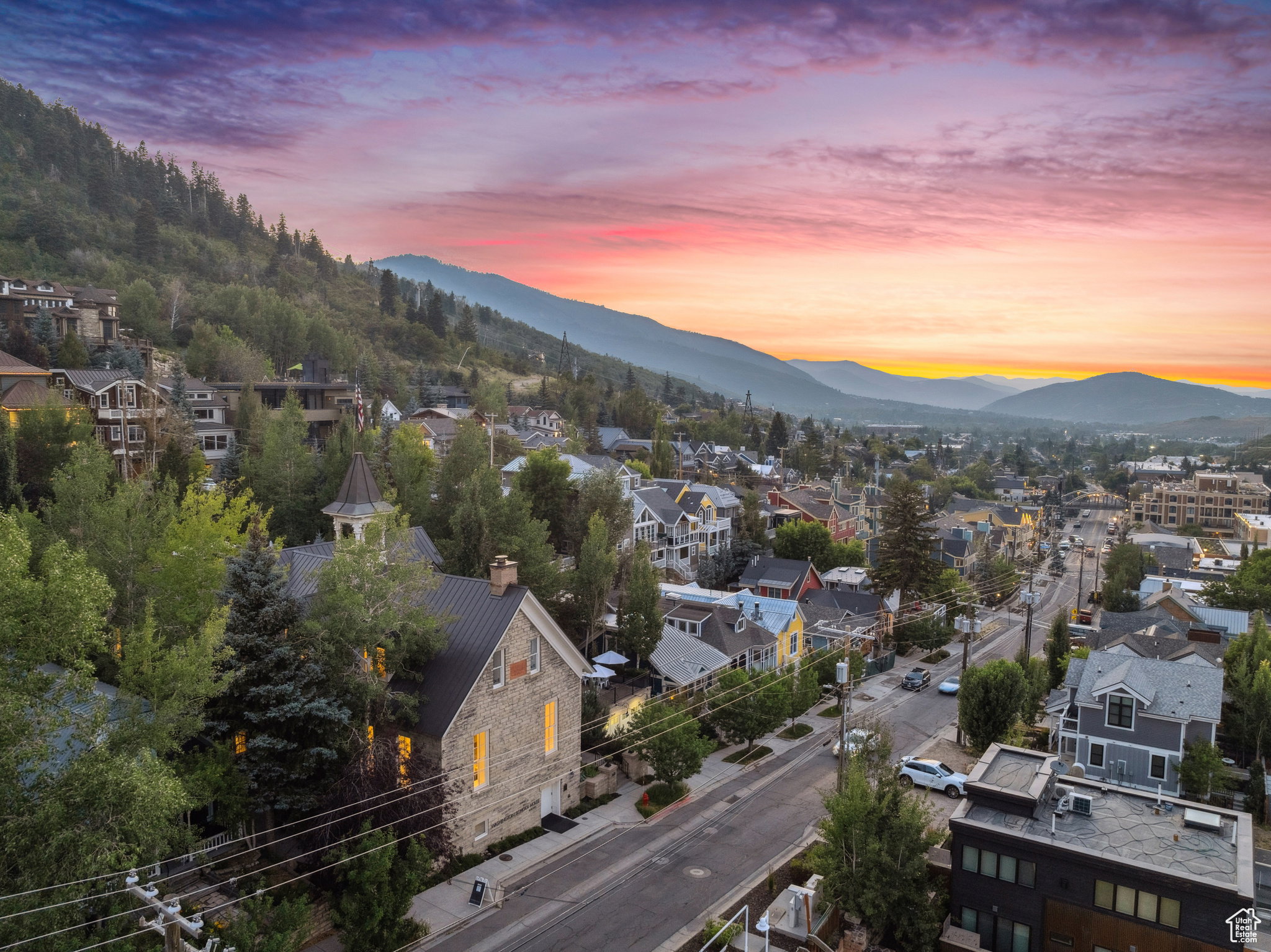 Aerial view at dusk of a mountain view and a residential view