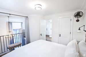 Bedroom featuring ornamental molding