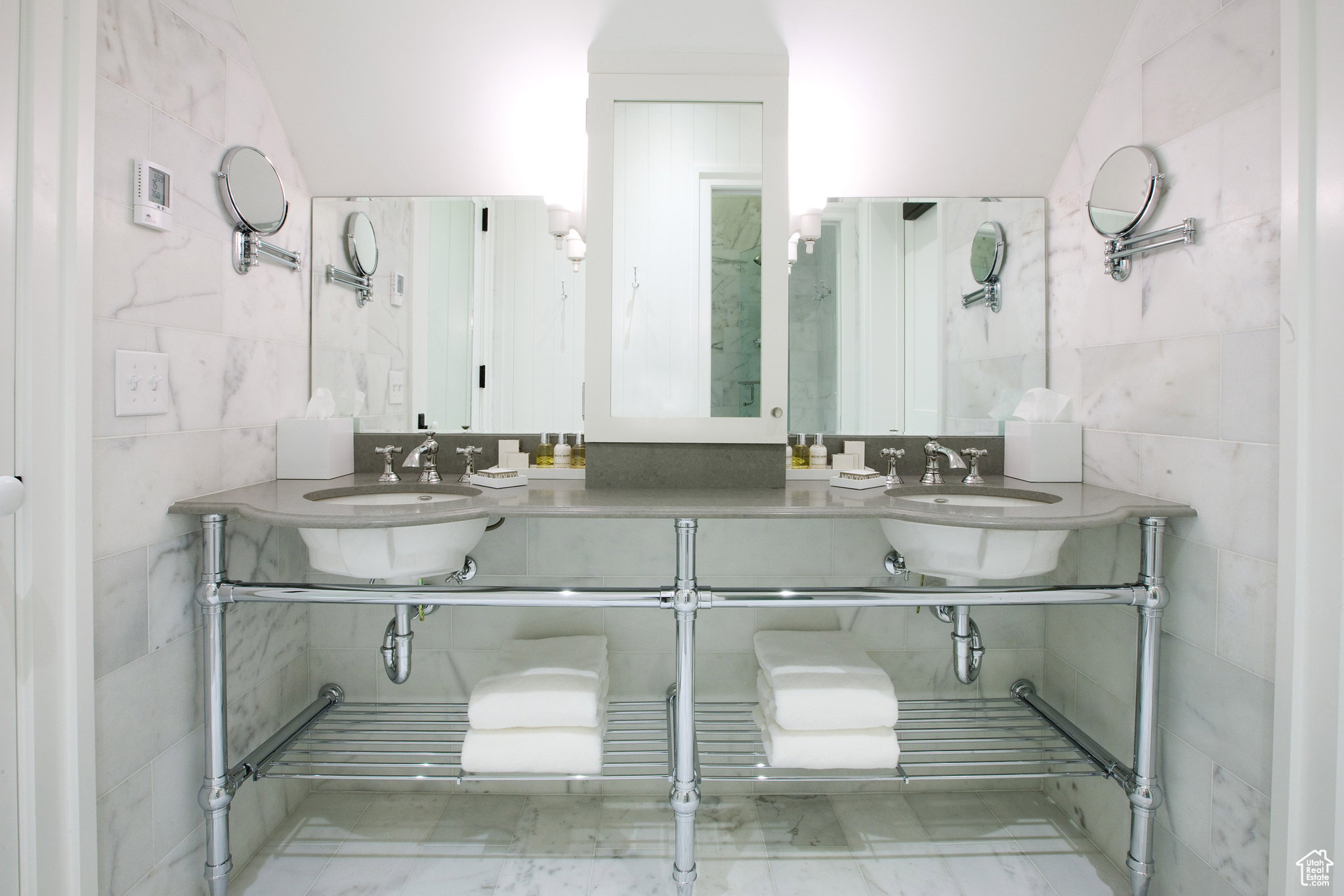 Full bathroom featuring tile walls