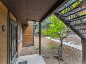 View of patio featuring stairs