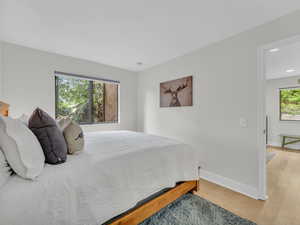 Bedroom featuring light wood-style flooring and recessed lighting