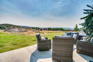 View of patio with an outdoor living space