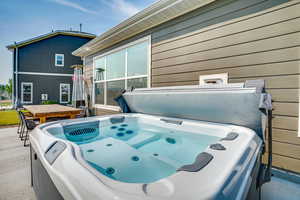 Exterior space featuring a hot tub