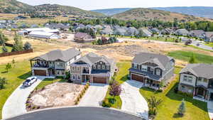 Aerial perspective of suburban area with mountains