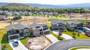 Aerial view of residential area with a mountain backdrop