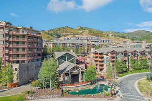 View of apartment building / complex with a mountain view