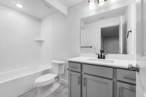 Full bathroom featuring vanity and tub / shower combination