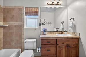 Full bathroom featuring vanity and bathtub / shower combination