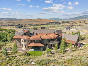 View of subject property featuring mountains