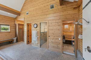 Interior space featuring wood walls