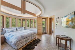 Bedroom featuring access to exterior and recessed lighting