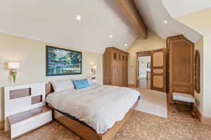 Carpeted bedroom with baseboards and recessed lighting