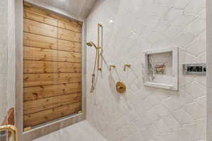 Bathroom with tiled shower