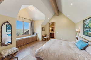 Bedroom with beamed ceiling, tile patterned floors, recessed lighting, and high vaulted ceiling