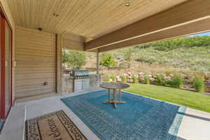 View of patio with exterior kitchen