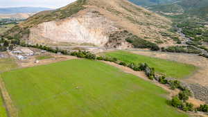 Aerial view of sparsely populated area featuring a mountainous background