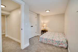 Bedroom featuring carpet floors