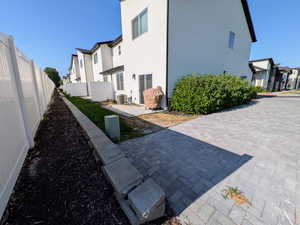 Surrounding community with a residential view and a patio area