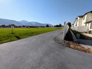 View of asphalt road featuring a mountain view