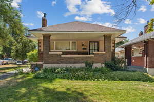 Craftsman Bungalow-style home with a covered porch