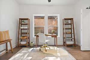 Office, bedroom, or dining room with wood finished floors
