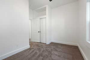 Spare room with carpet flooring and baseboards