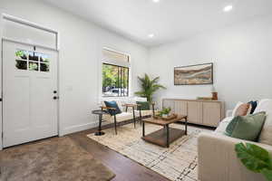 Entrance foyer featuring hardwood / wood-style floors and recessed lighting
