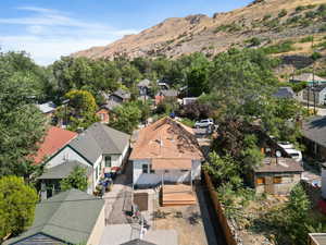 Aerial view of residential area featuring mountains