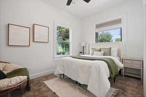 Bedroom with carpet and a ceiling fan