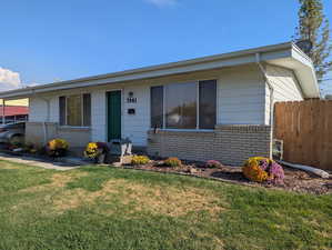 View of front of property with brick siding