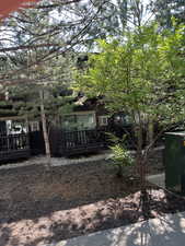 Back of house featuring a deck