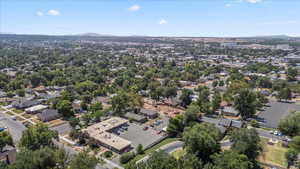 Aerial view of residential area featuring a mountainous background