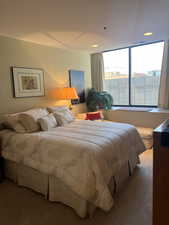 Bedroom with carpet floors and recessed lighting