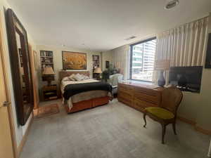 Bedroom featuring recessed lighting and light colored carpet