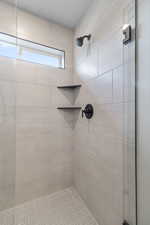 Bathroom with tiled shower