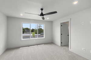 Unfurnished room with carpet, ceiling fan, and recessed lighting