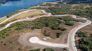 View of property location with a nearby body of water