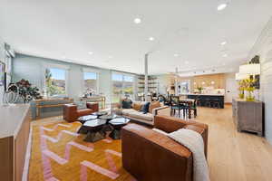 Living area featuring recessed lighting and light wood-type flooring