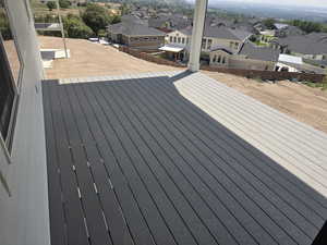 Wooden deck featuring a residential view