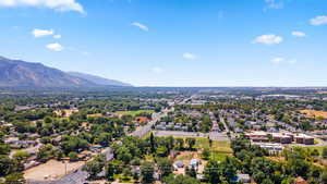 Aerial perspective of suburban area featuring mountains